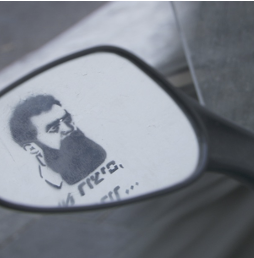 Theodore Herzl on a side view mirror from the film, "Colliding Dreams"
