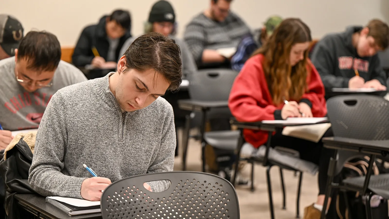 Students taking notes in Professor Bert Harrill's history class
