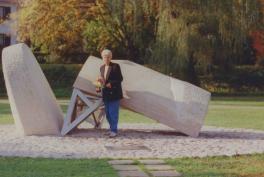 Michael Turner's grandmother with the monument to Jews in her village
