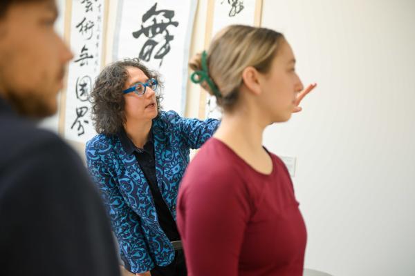 Professor Hannah Kosstrin with students