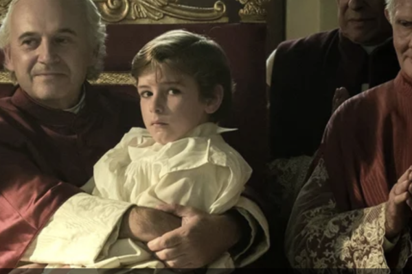 a boy and a priest